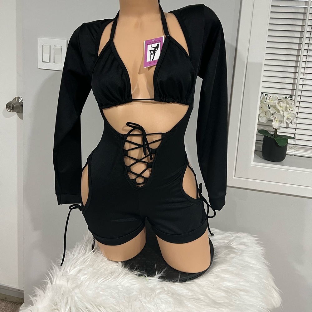 Exotic dancer wear black romper